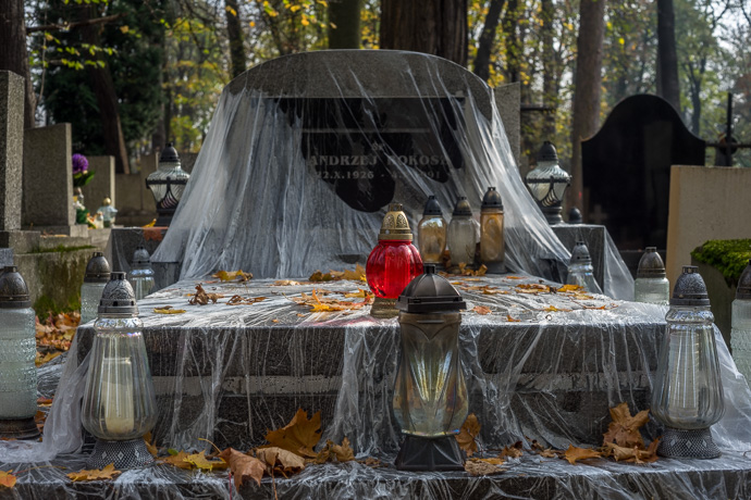 A grave is covered with plastic, All Saints' Day in Poland. Image: Michel Meijer