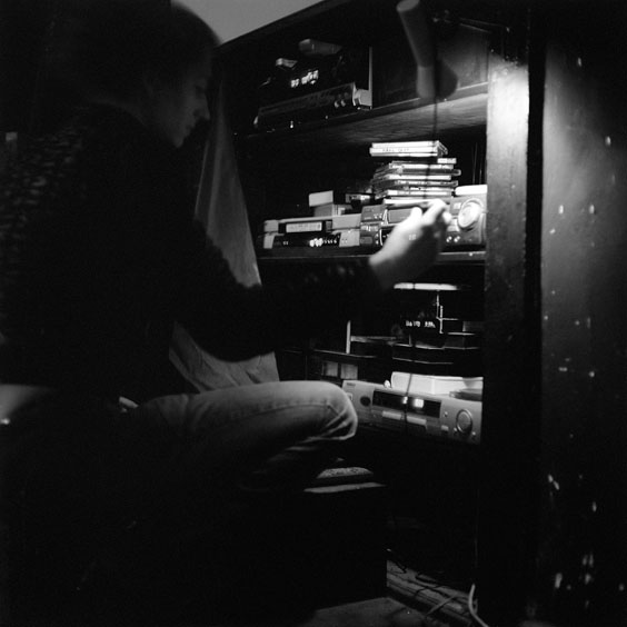 A staff member operates the video playback devices. Image: Michel Meijer