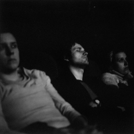 A visitor sleeps during the film screening. Image: Michel Meijer