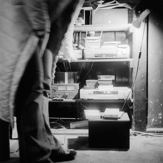 A staff member operates the screen playback equipment in the cinema. Image: Michel Meijer