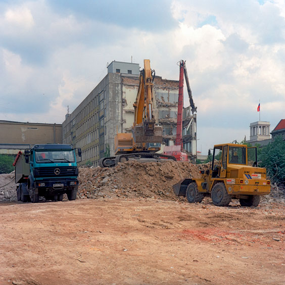 A sand truck, bulldozer and two demolition machines at a construction site in Berlin. Image: Michel Meijer
