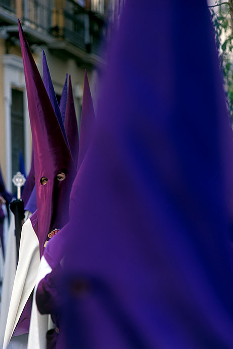 A line of hooded penitents in the procession. Image: Michel Meijer