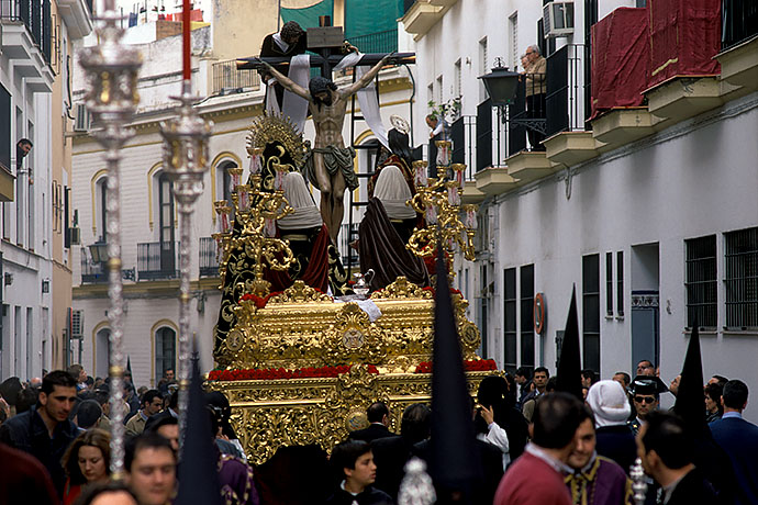 An altar moves in a procession through the streets of Seville. Image: Michel Meijer